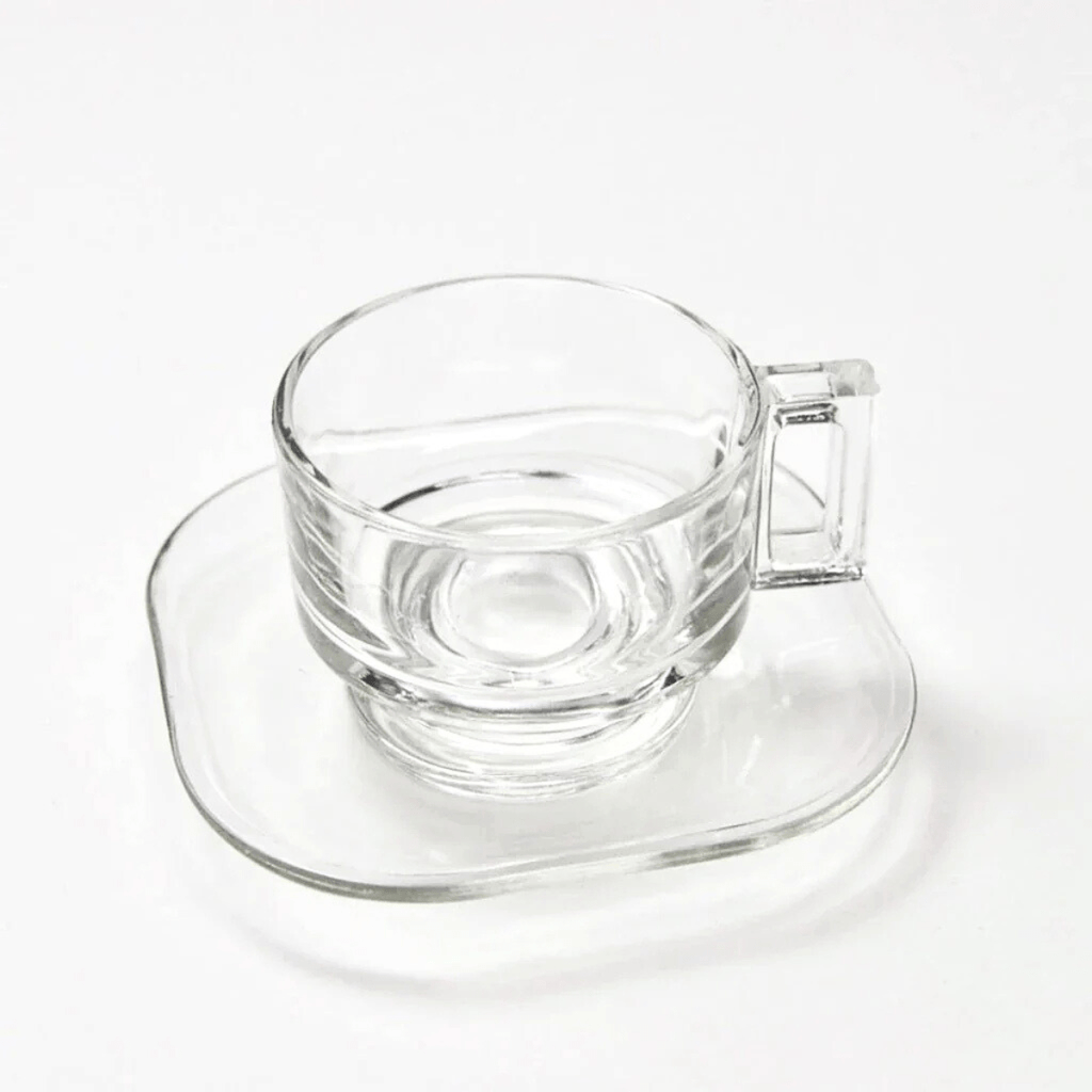 Full set of 6 vintage Joe Colombo Arno espresso cups and saucers, mid-century modern Italian pressed glass tableware on a white background.