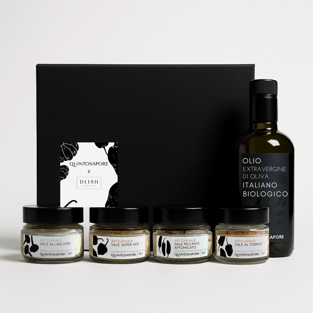 Luxury Italian gift box featuring DLISH × Quintosapore collaboration with four artisanal sea salts and a bottle of organic extra virgin olive oil from Umbria, displayed against a black presentation box.