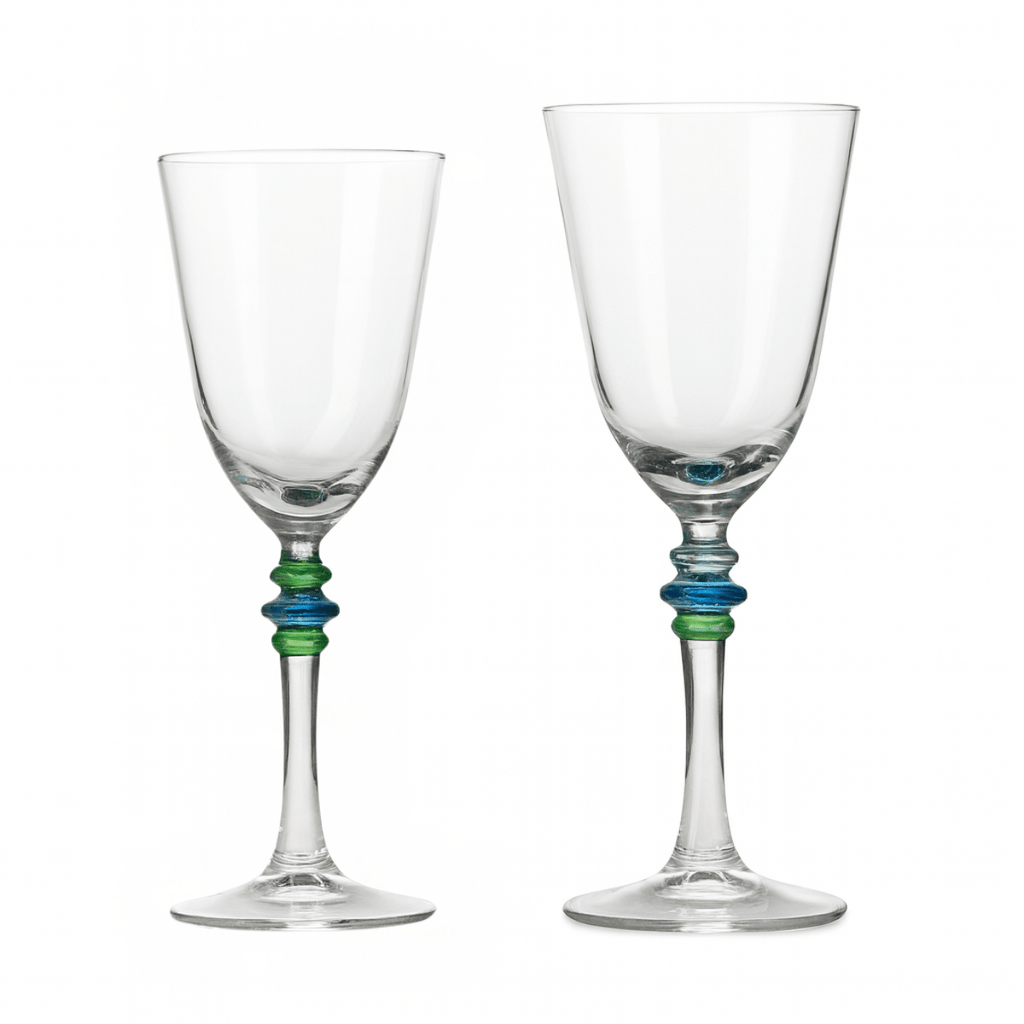 Set of two vintage French Biot-style hand-blown crystal wine glasses with blue and green coloured rings on the stems, shown on a white background.”